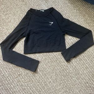 Gymshark long sleeve crop workout top. Dark grey size small lightly worn.